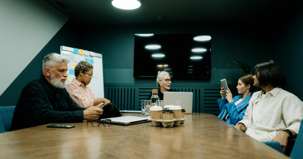 Group of freelancers discussing job opportunities.